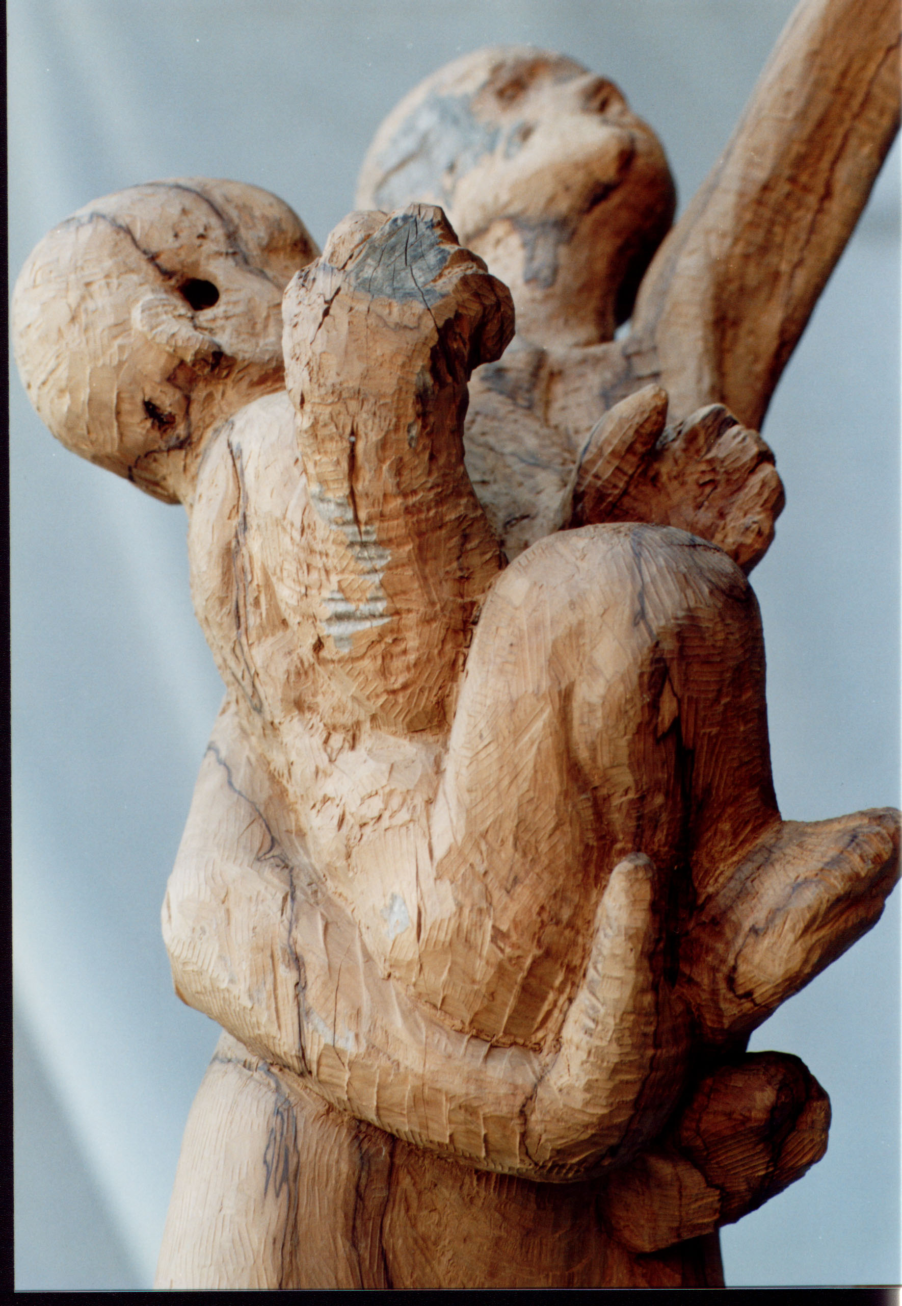 Dettaglio di maternità, mani e volto ravvicinati